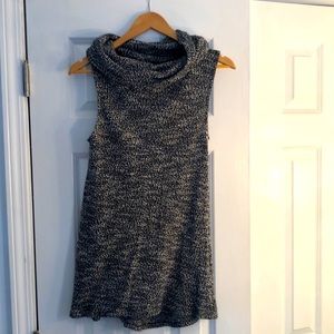 Black and white cowl neck top. Hits about mid bum (I’m 5’8”)